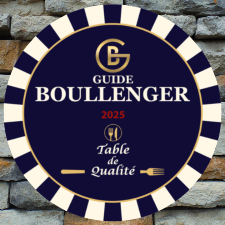 logo sur mur de pierre